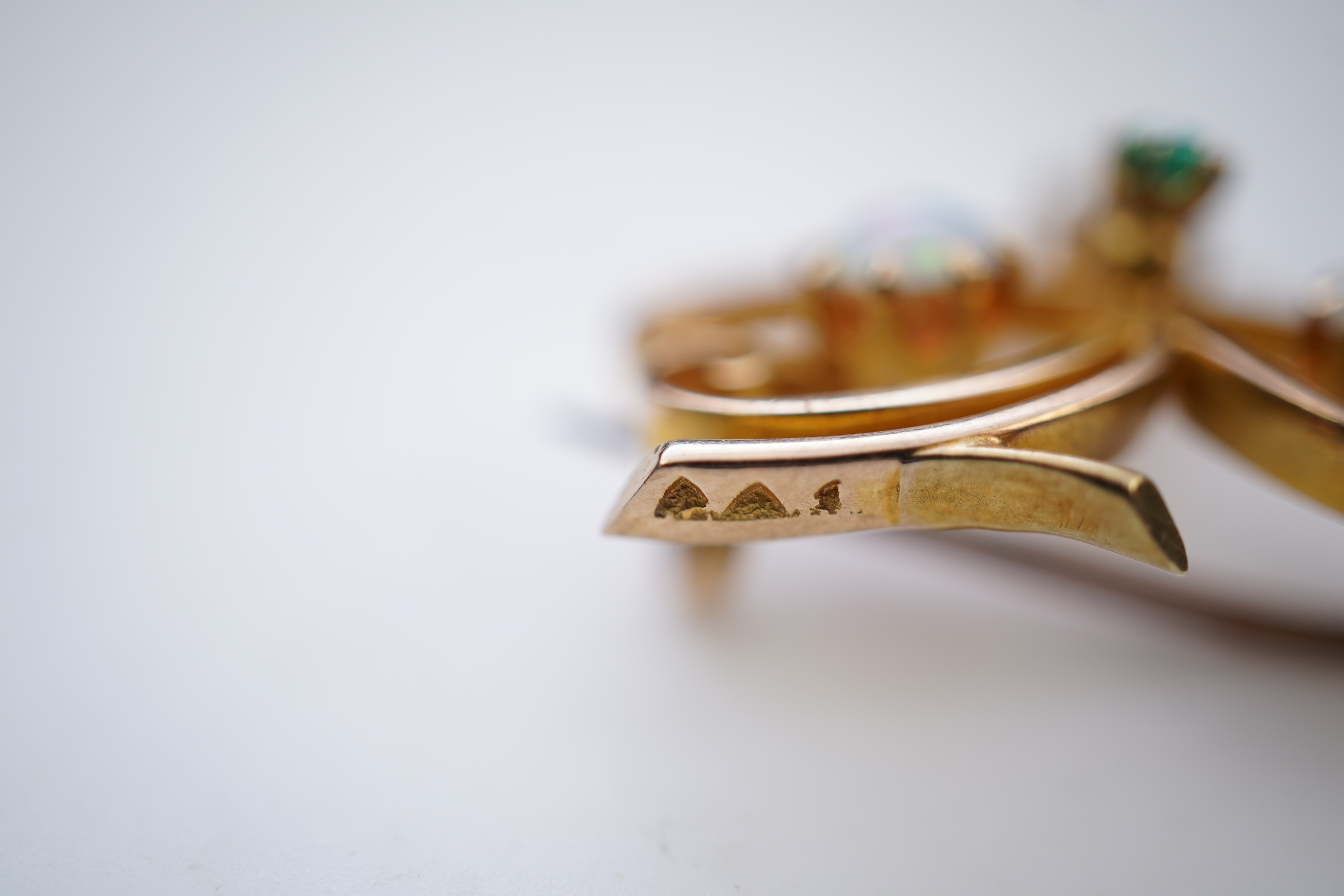 Two gem-set brooches